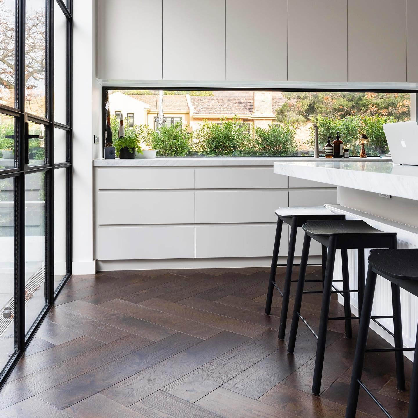 Finished herringbone oak floor in a designer furnished Melbourne home